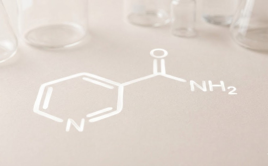 Niacinamide molecular structure visualized in a soft, minimal style